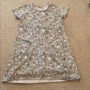 Girl’s dress by Art and eden with swan print.